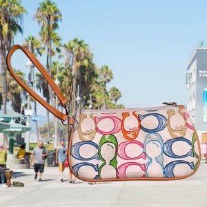 oach Wristlet Multi Color.Signature Fabric.